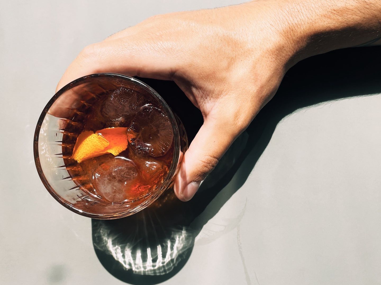 clear glass bowl with orange liquid