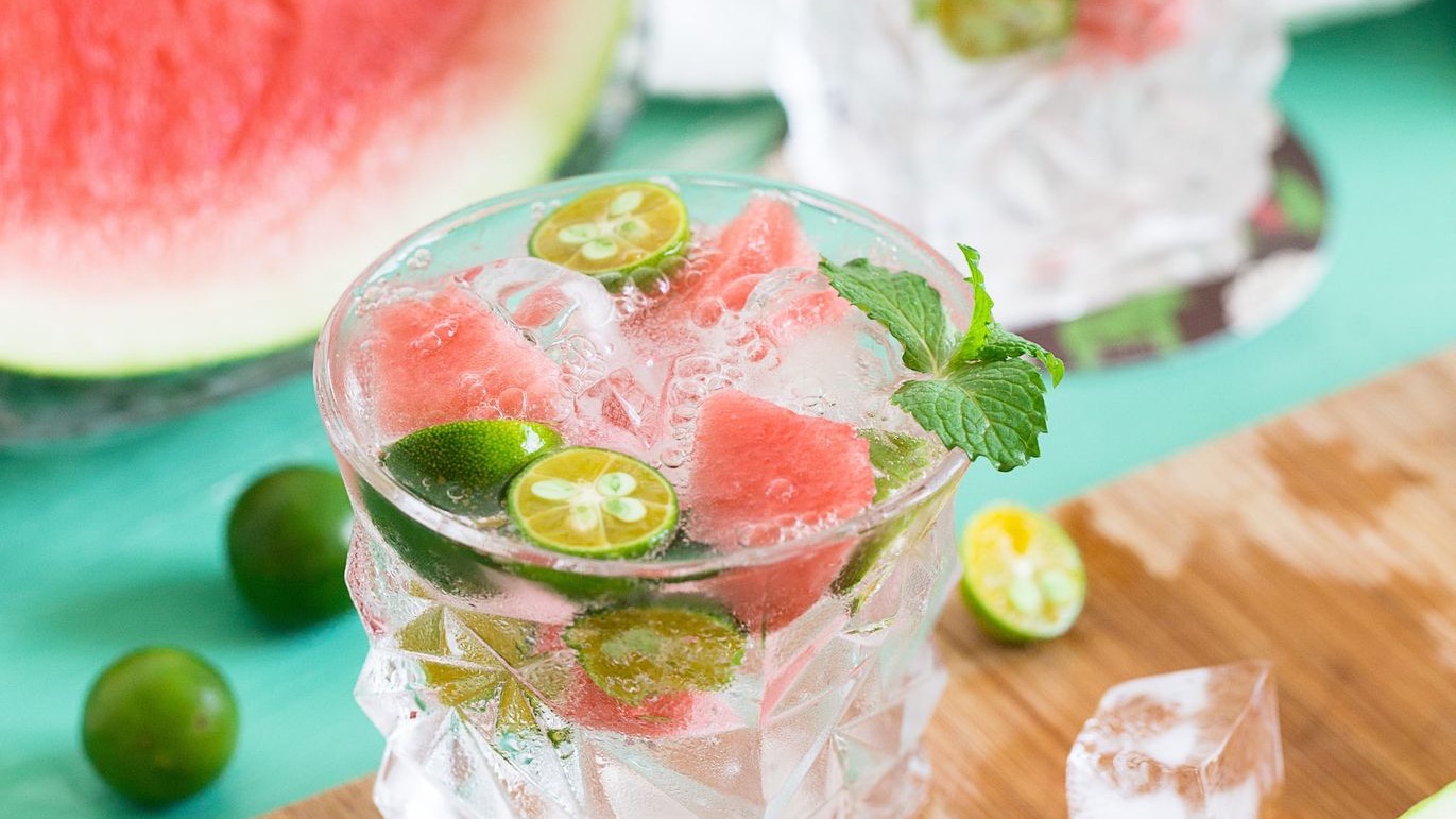 sliced watermelon with lemon on shot glass